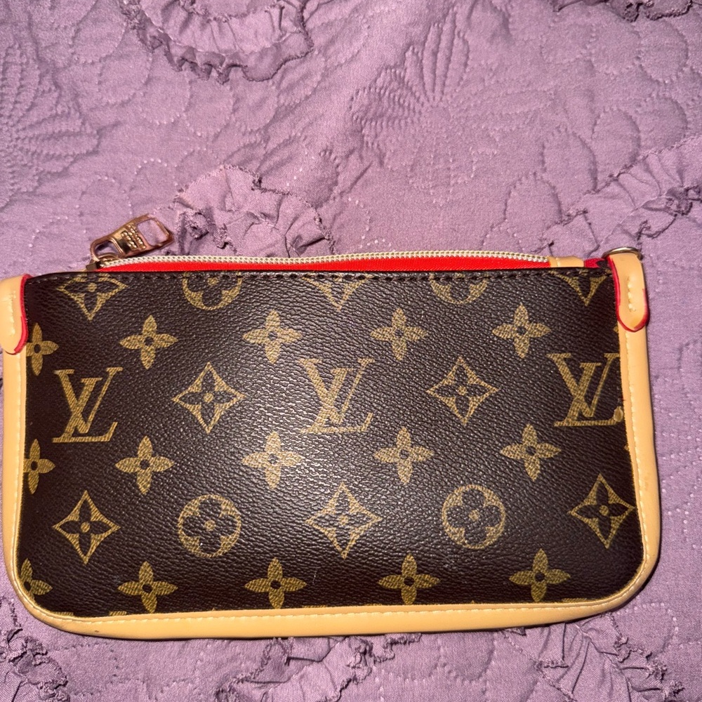 Brown and tan monogram wristlet